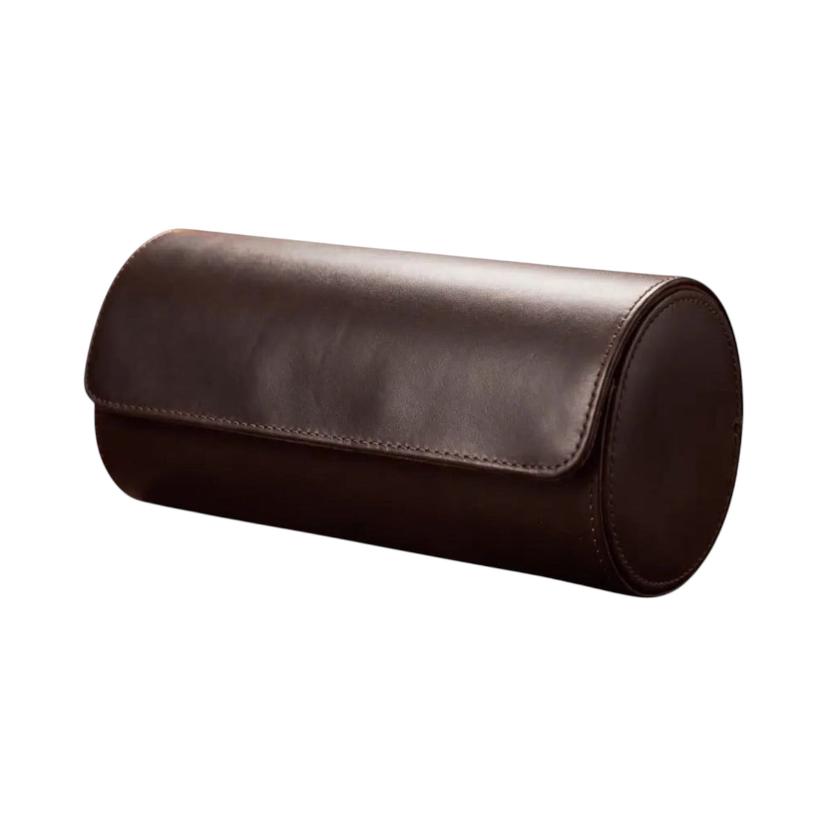 Étui de voyage pour 3 montres Maison Orvian en similicuir marron ébène, format cylindrique compact et élégant.
