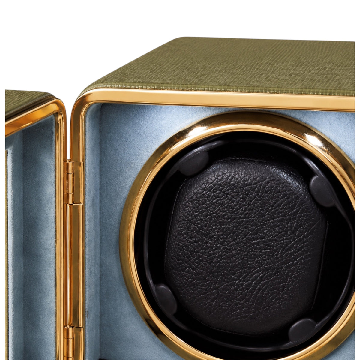 Remontoir pour montre automatique Maison Orvian Boréale vert émeraude avec intérieur bleu clair et détails dorés