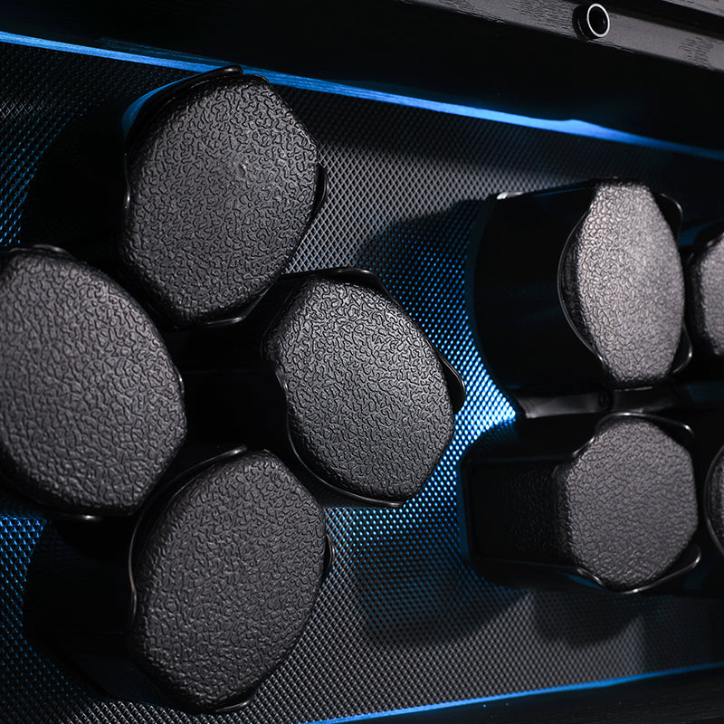 Détail du remontoir Zénith : coussins, LED bleue, bois noir veiné